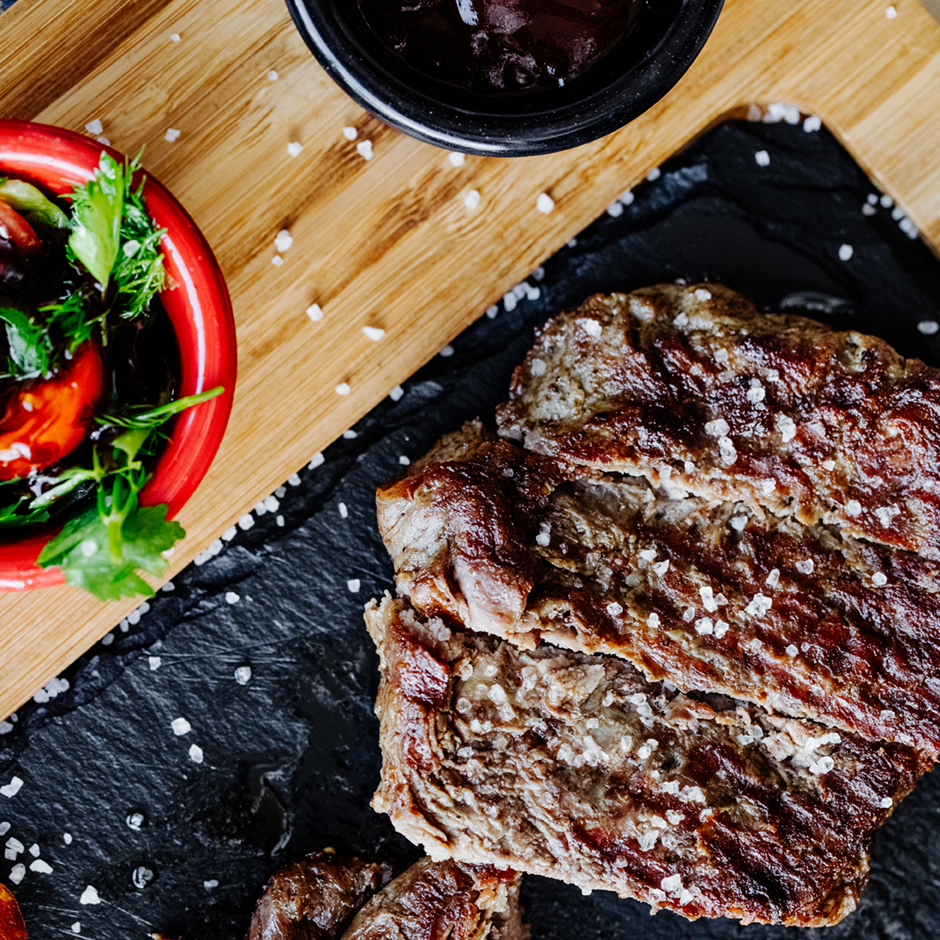 cutting-steak-with-knife-fork